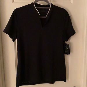 Nike golf shirt.